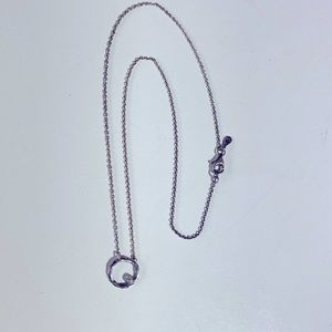 Silpada necklace. Round disc with clear stone.